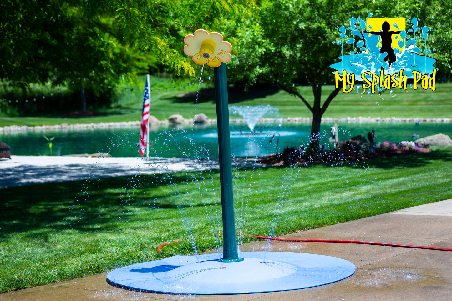 Flower Shower Portable Splash Pad water play feature with a tall green stem and yellow flower head spraying water, backyard splash pad fun.