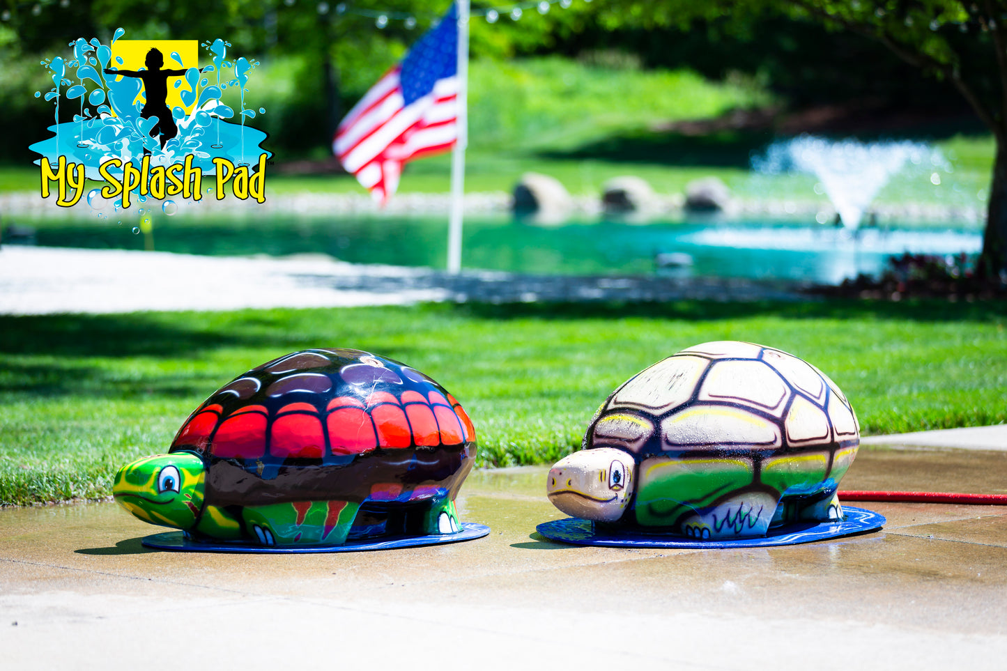 Medium Turtle Spray and Play Feature by My Splash Pad – interactive turtle splash pad water play structure spraying streams of water at an outdoor park.
