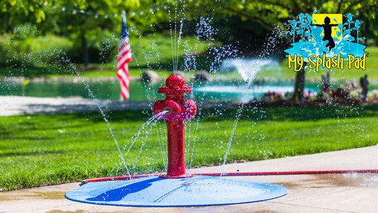 Fire Hydrant Portable Splash Pad water play feature spraying streams of water, outdoor installation by My Splash Pad.