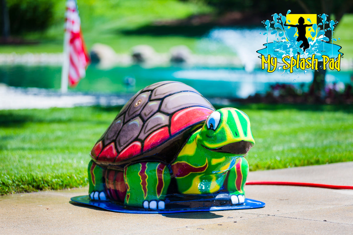 Large Turtle Water Play – colorful turtle splash pad feature with brown and red shell spraying water for kids’ outdoor fun