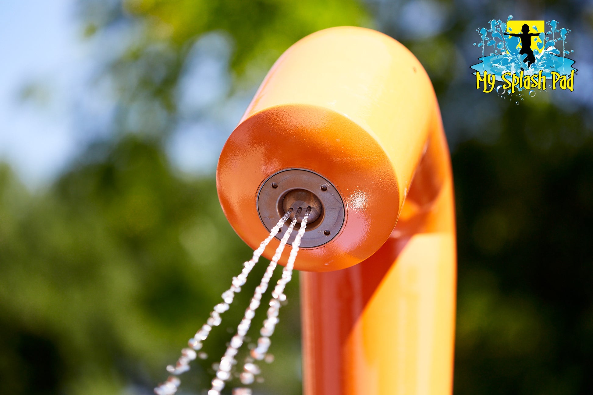 Close-up of Rain Blaster Portable Splash Pad nozzle spraying multiple water streams from curved orange post by My Splash Pad.
