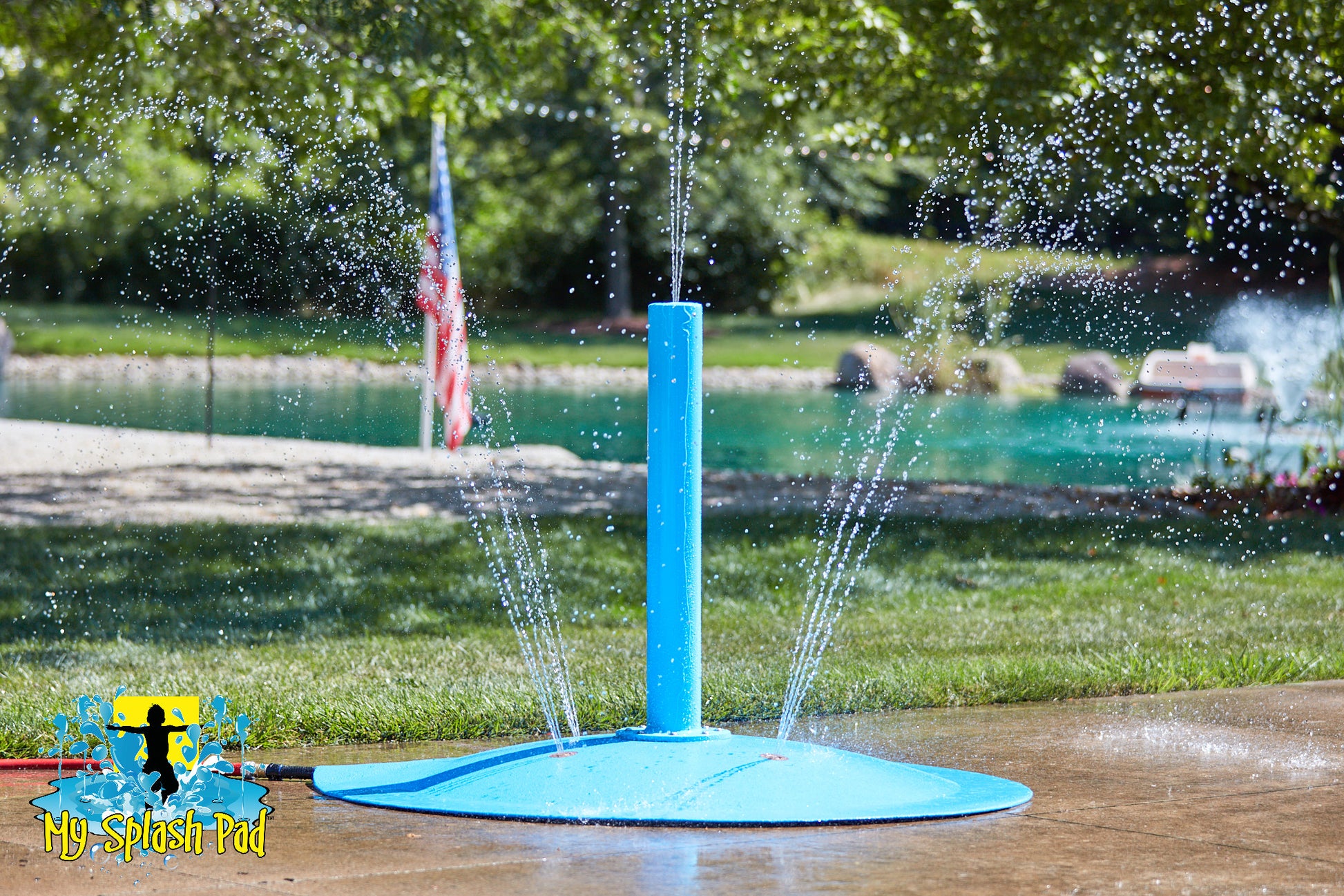 Small Rain Stick Portable Splash Pad Water Play Feature – tall blue cylindrical water spray post for backyard splash pads.